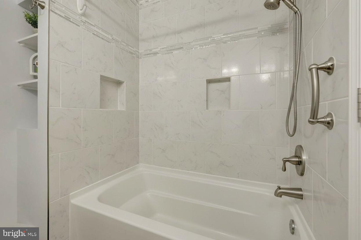 1008 Moore Place Southwest Vienna, VA 22180 - Photo 34 of 55 a close view of a bathtub in bathroom