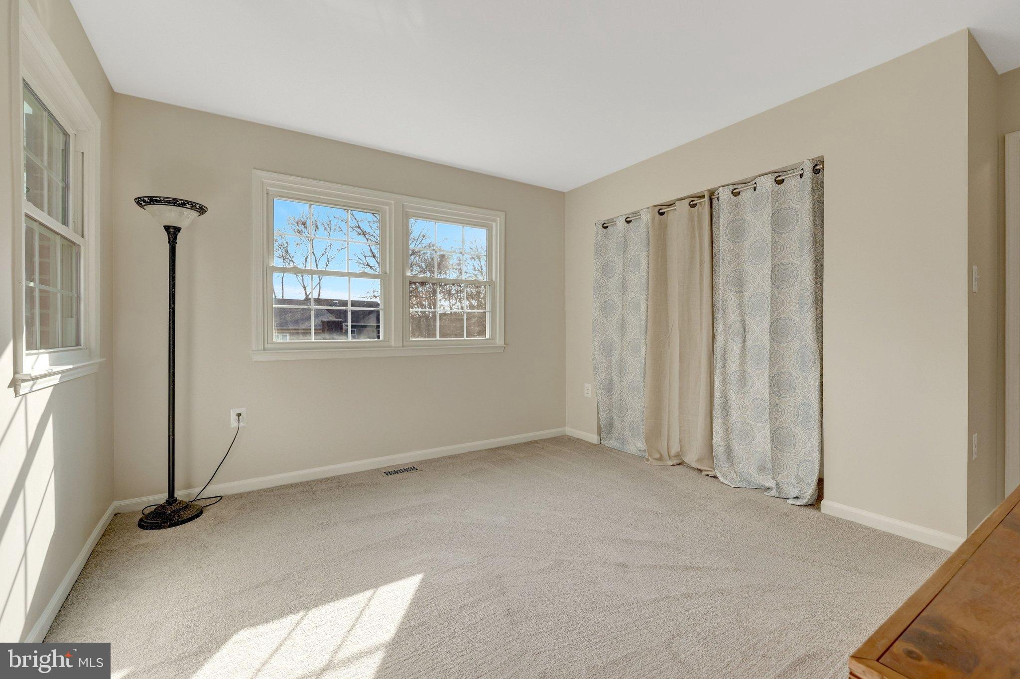 1008 Moore Place Southwest Vienna, VA 22180 - Photo 39 of 55 a view of an empty room with a window