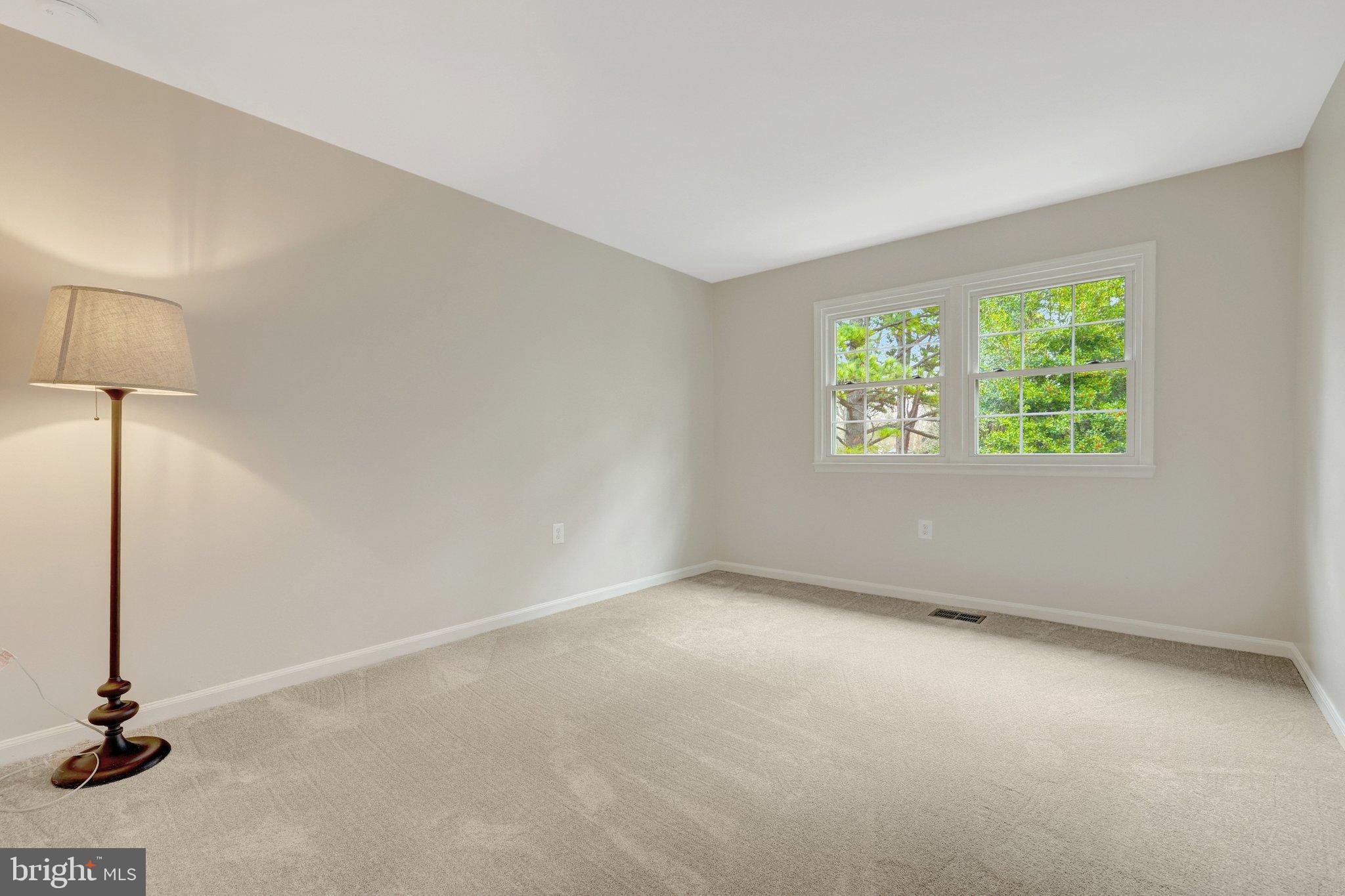 1008 Moore Place Southwest Vienna, VA 22180 - Photo 40 of 55 a view of an empty room with a window