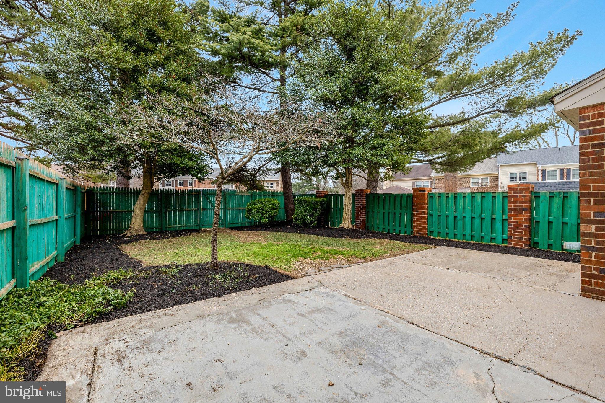 1008 Moore Place Southwest Vienna, VA 22180 - Photo 46 of 55 a view of a backyard with tree s