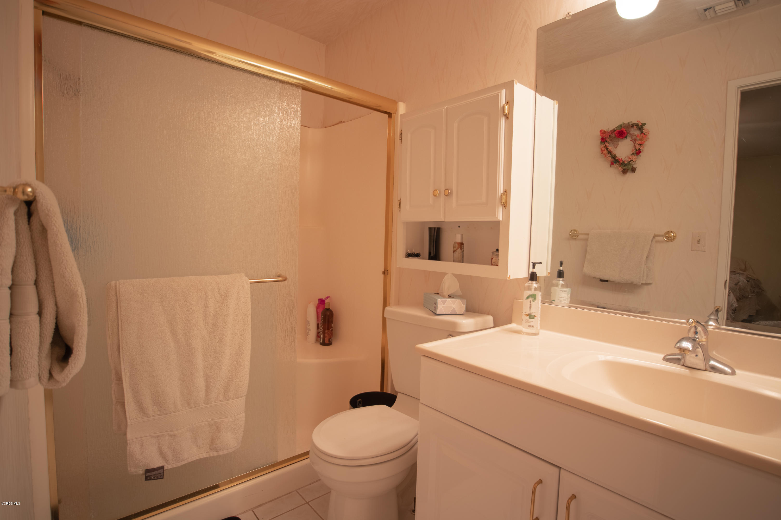 1113 Waltham Road Simi Valley, CA 93065 - Photo 13 of 20 a bathroom with a sink a toilet and shower