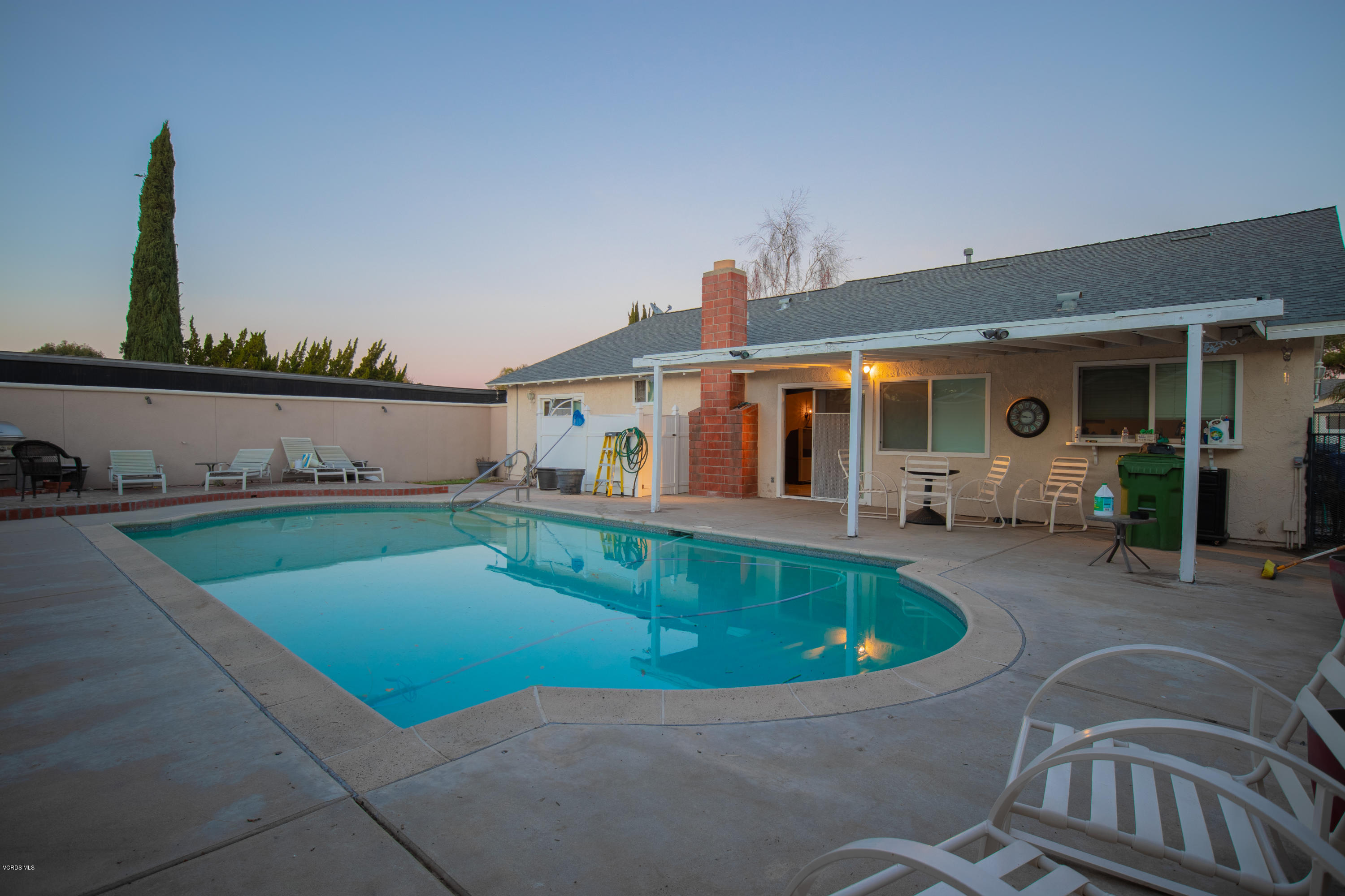 1113 Waltham Road Simi Valley, CA 93065 - Photo 16 of 20 a view of a house with swimming pool and porch