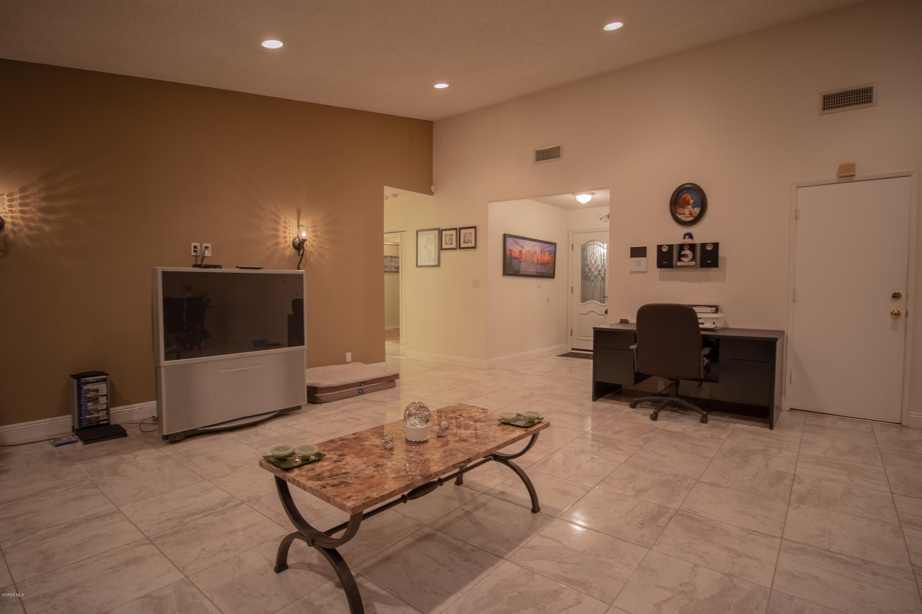 1113 Waltham Road Simi Valley, CA 93065 - Photo 3 of 20 a living room with furniture and a flat screen tv