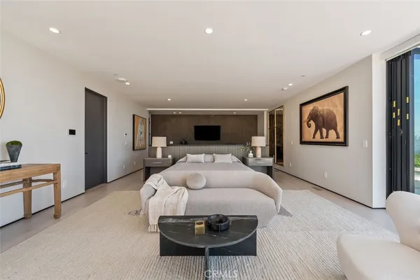 a bed room with a bed and a cabinets