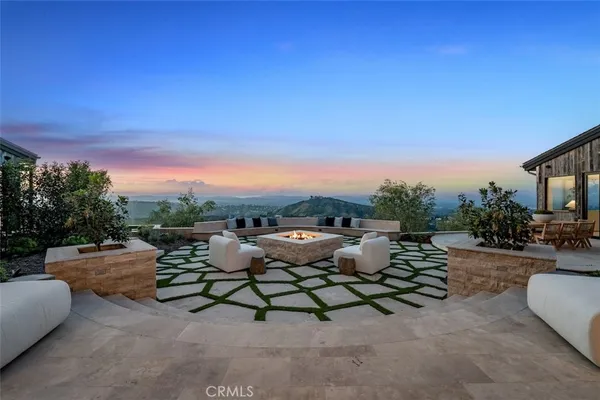 a view of a terrace with furniture