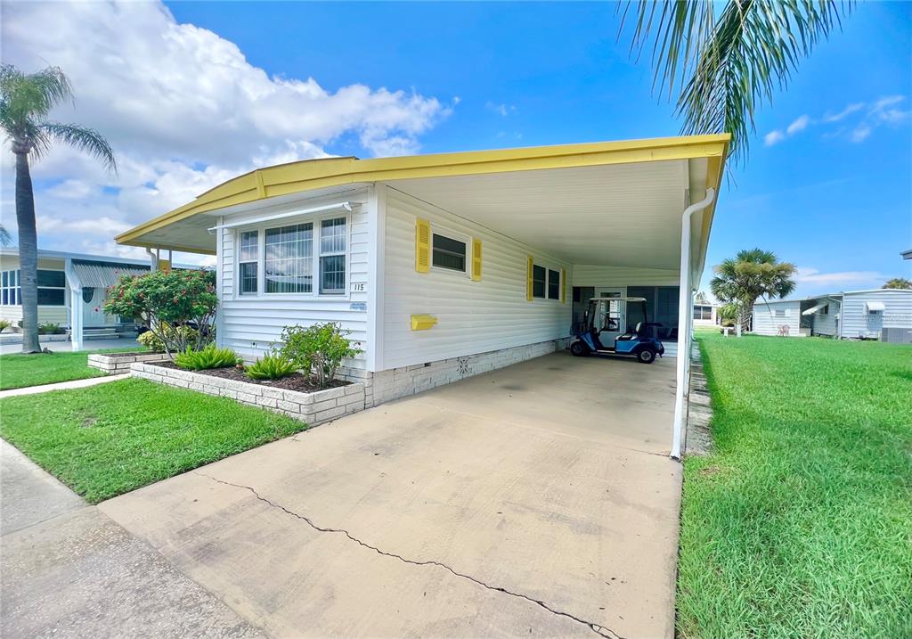 1100 South Belcher Road, Unit 115 Largo, FL 33771 - Photo 3 of 54 NE side of driveway