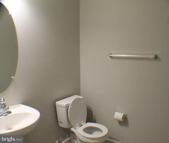 a view of an entryway with wooden floor and stairs