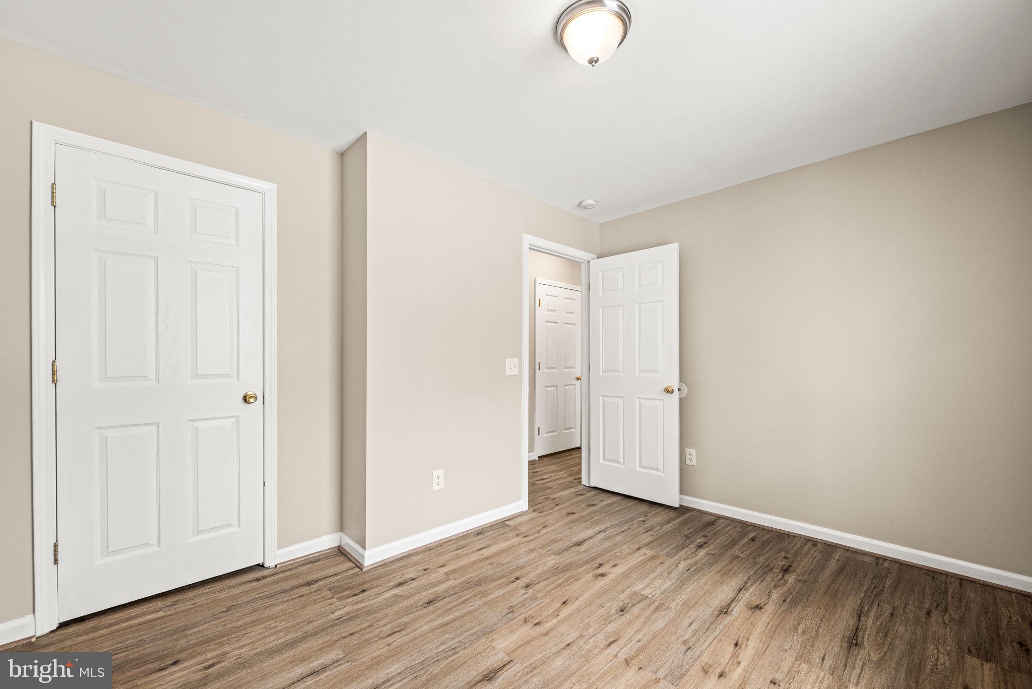 3096 Upper Valley Road Parkesburg, PA 19365 - Photo 18 of 31 a view of a room with wooden floor