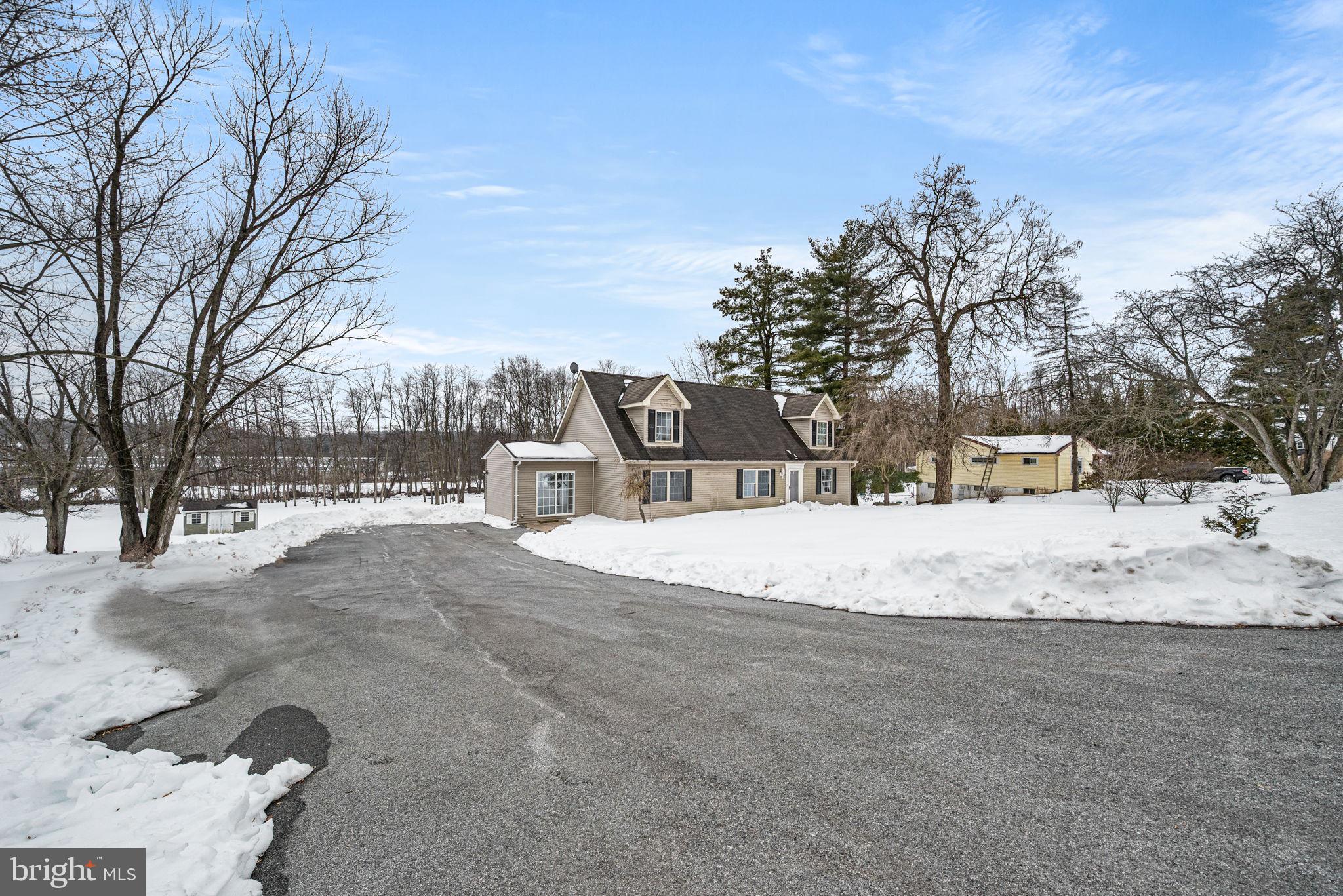 3096 Upper Valley Road Parkesburg, PA 19365 - Photo 2 of 31 a view of a yard covered with snow