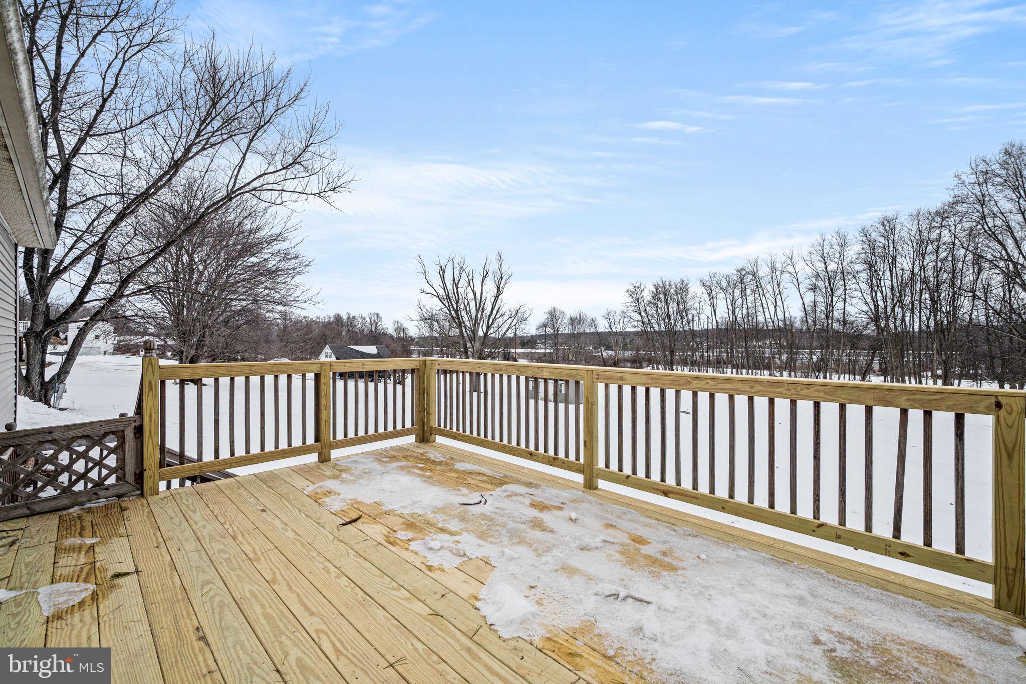 3096 Upper Valley Road Parkesburg, PA 19365 - Photo 21 of 31 a view of a wooden roof deck