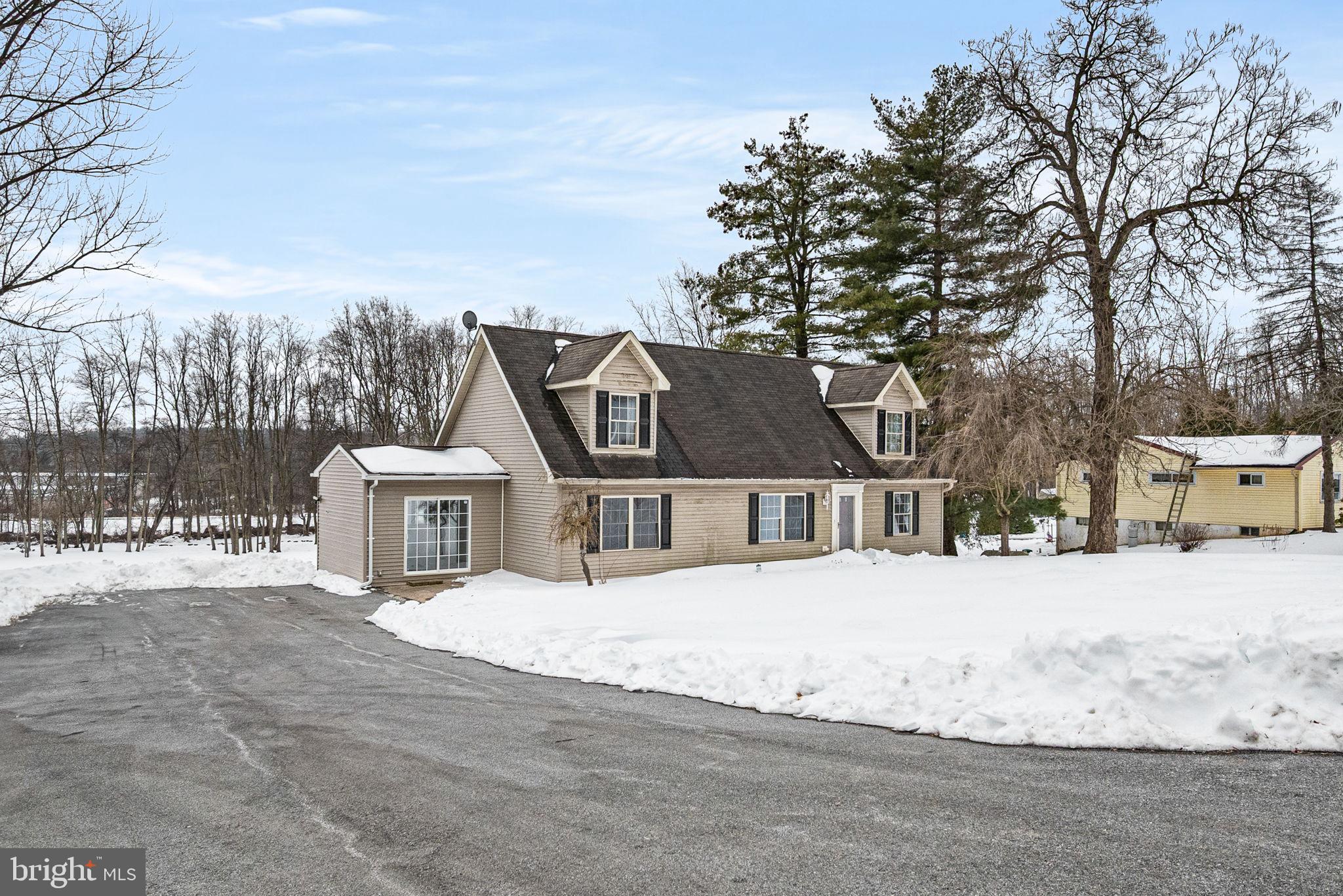 3096 Upper Valley Road Parkesburg, PA 19365 - Photo 3 of 31 a view of white house with a snow in the yard