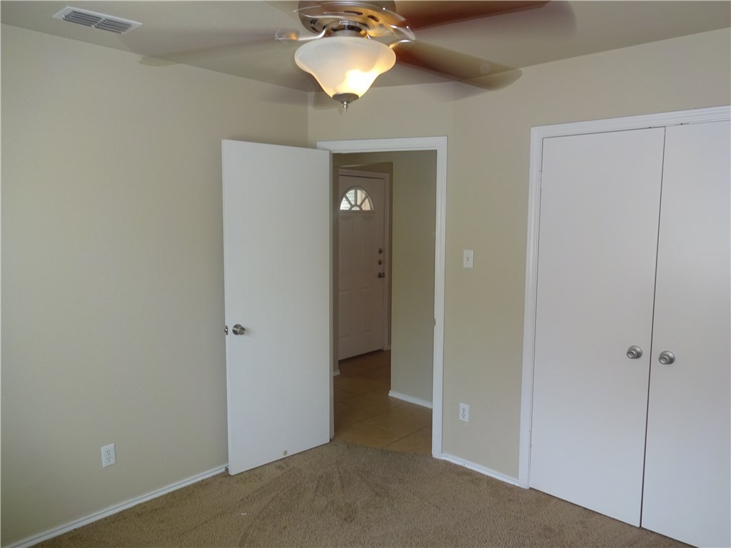 Undisclosed Address Corpus Christi, TX 78414 - Photo 15 of 16 a view of a chandelier fan and entryway