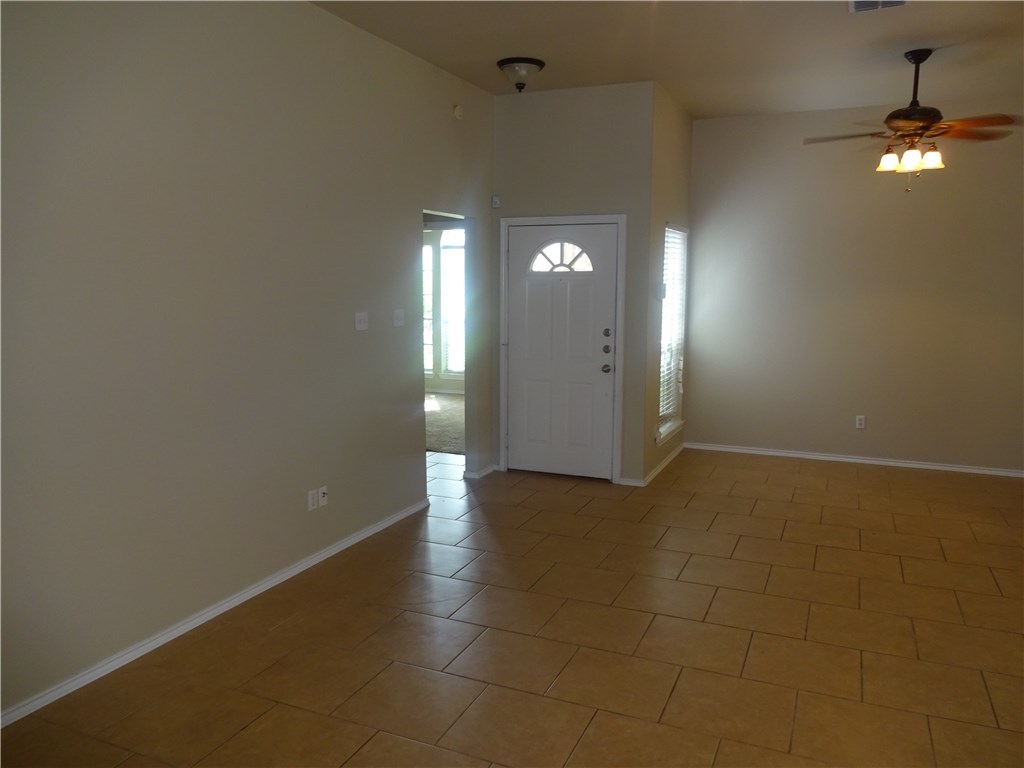 Undisclosed Address Corpus Christi, TX 78414 - Photo 3 of 16 a view of a livingroom with a fireplace