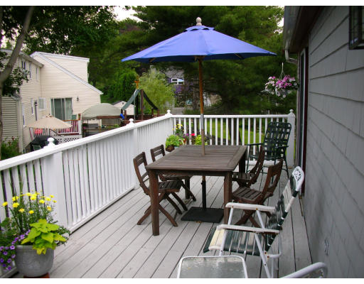 62 Kenneth Road Marblehead, MA 01945 - Photo 3 of 7 a view of a deck with furniture and a potted plants
