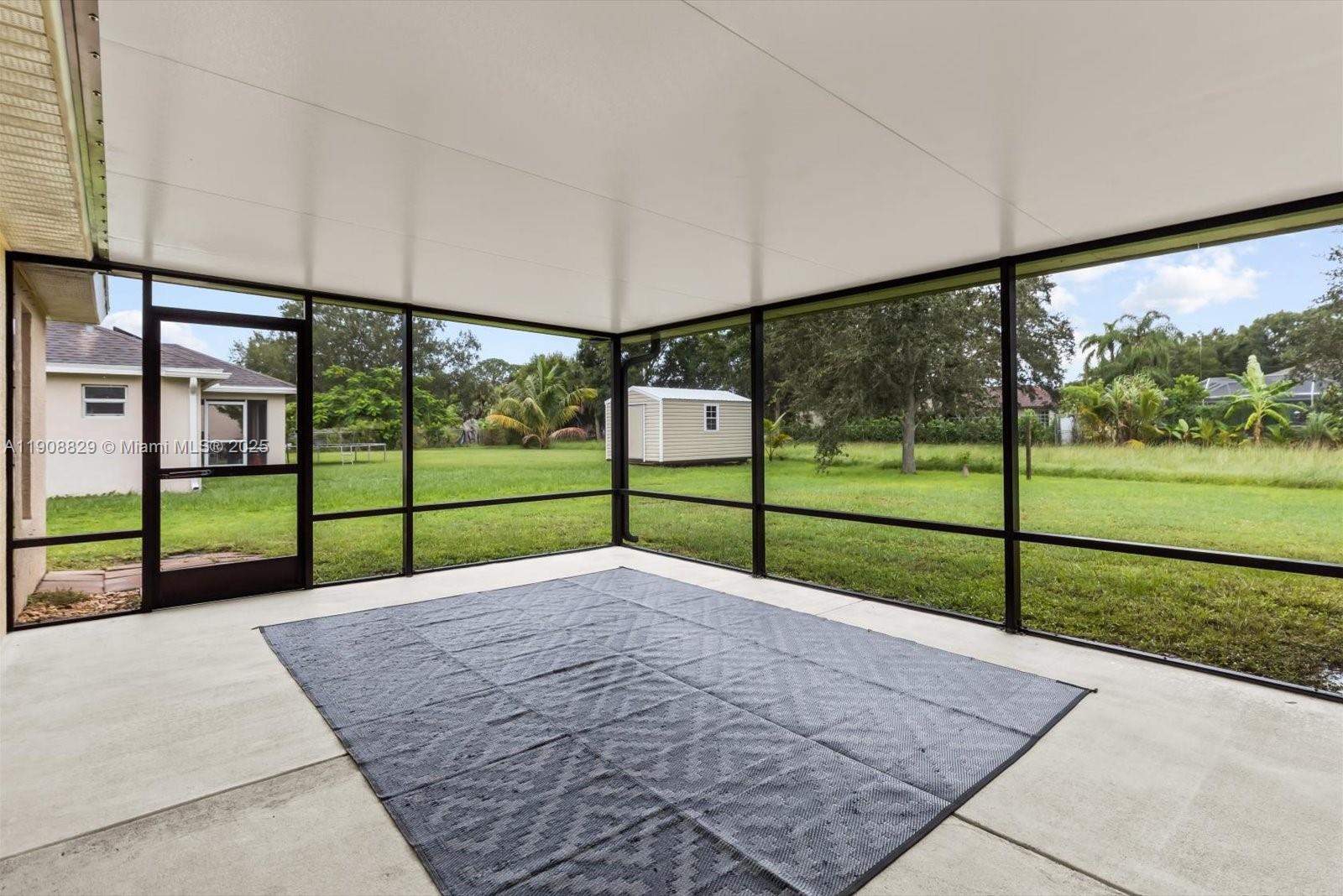 1392 Southwest Sudder Avenue Port St. Lucie, FL 34953 - Photo 27 of 30 a view of a park with wooden fence