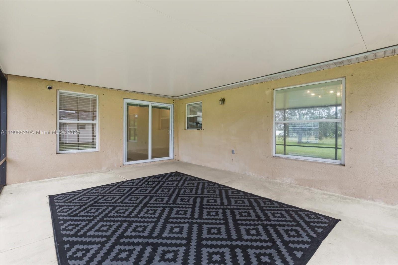 1392 Southwest Sudder Avenue Port St. Lucie, FL 34953 - Photo 28 of 30 a picture of a room with windows