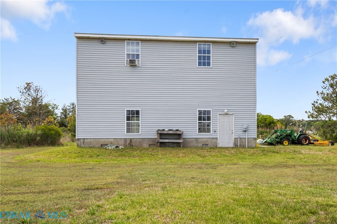 2297 Perrin Creek Road Hayes, VA 23072 - Photo 34 of 49 24x36 Garage/workshop with tall ceilings, 220 power, upstairs space, & included car lift