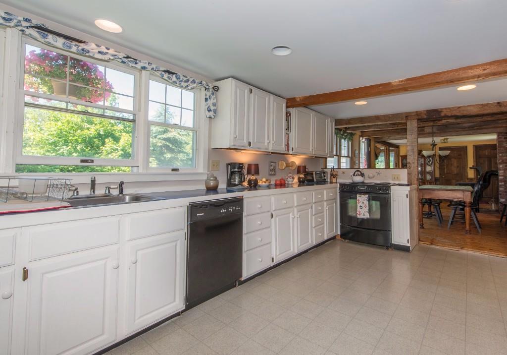 581 Ocean Point Road Boothbay, ME 04544 - Photo 7 of 25 Kitchen open to dining room