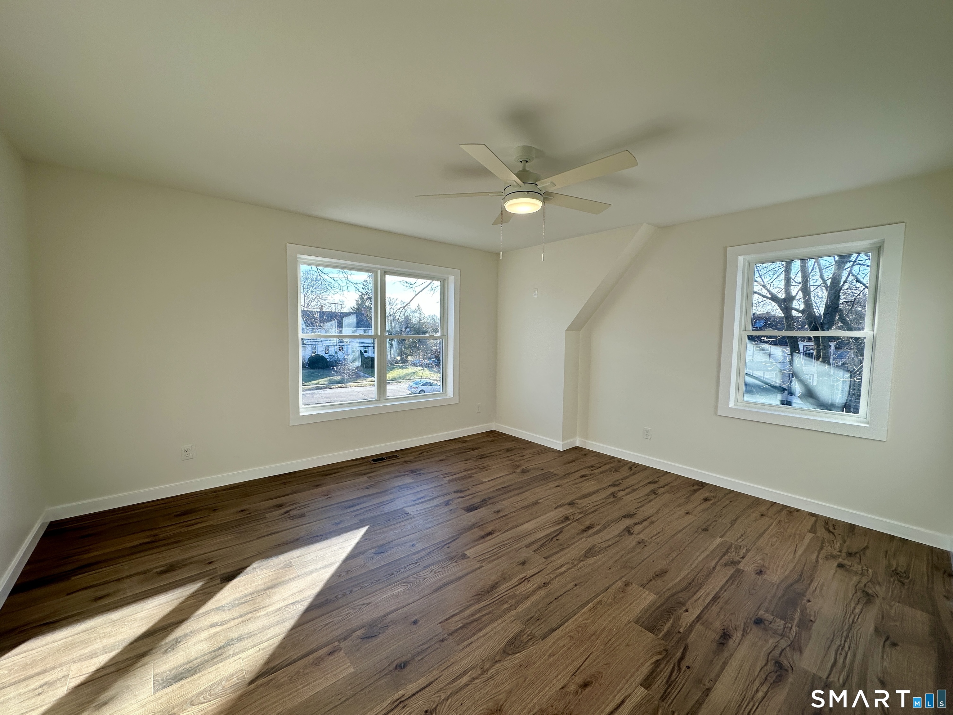 48 Cedar Street, Unit D Branford, CT 06405 - Photo 20 of 27 wooden floor in an empty room with a window