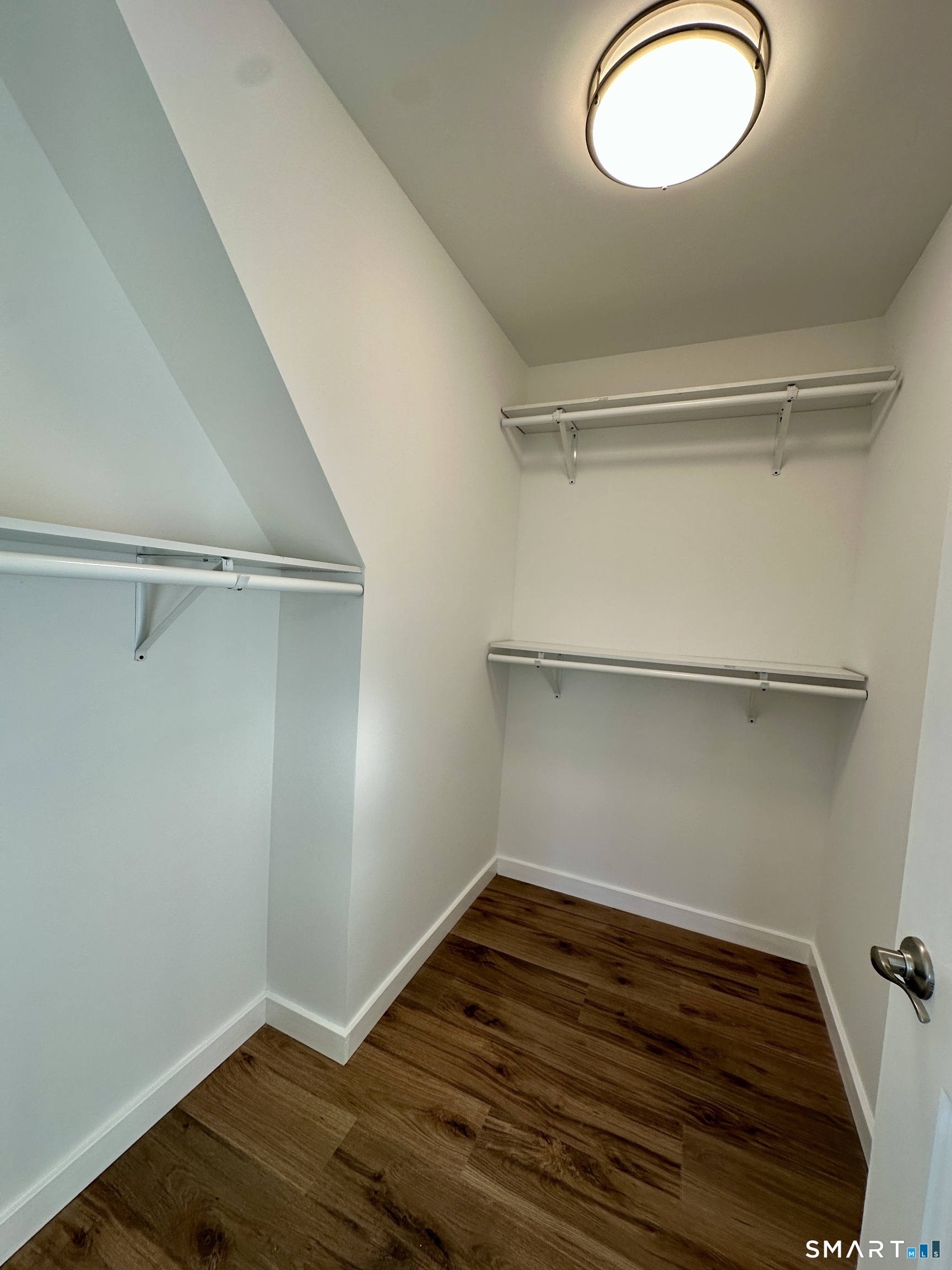 48 Cedar Street, Unit D Branford, CT 06405 - Photo 21 of 27 a view of a room with wooden floor