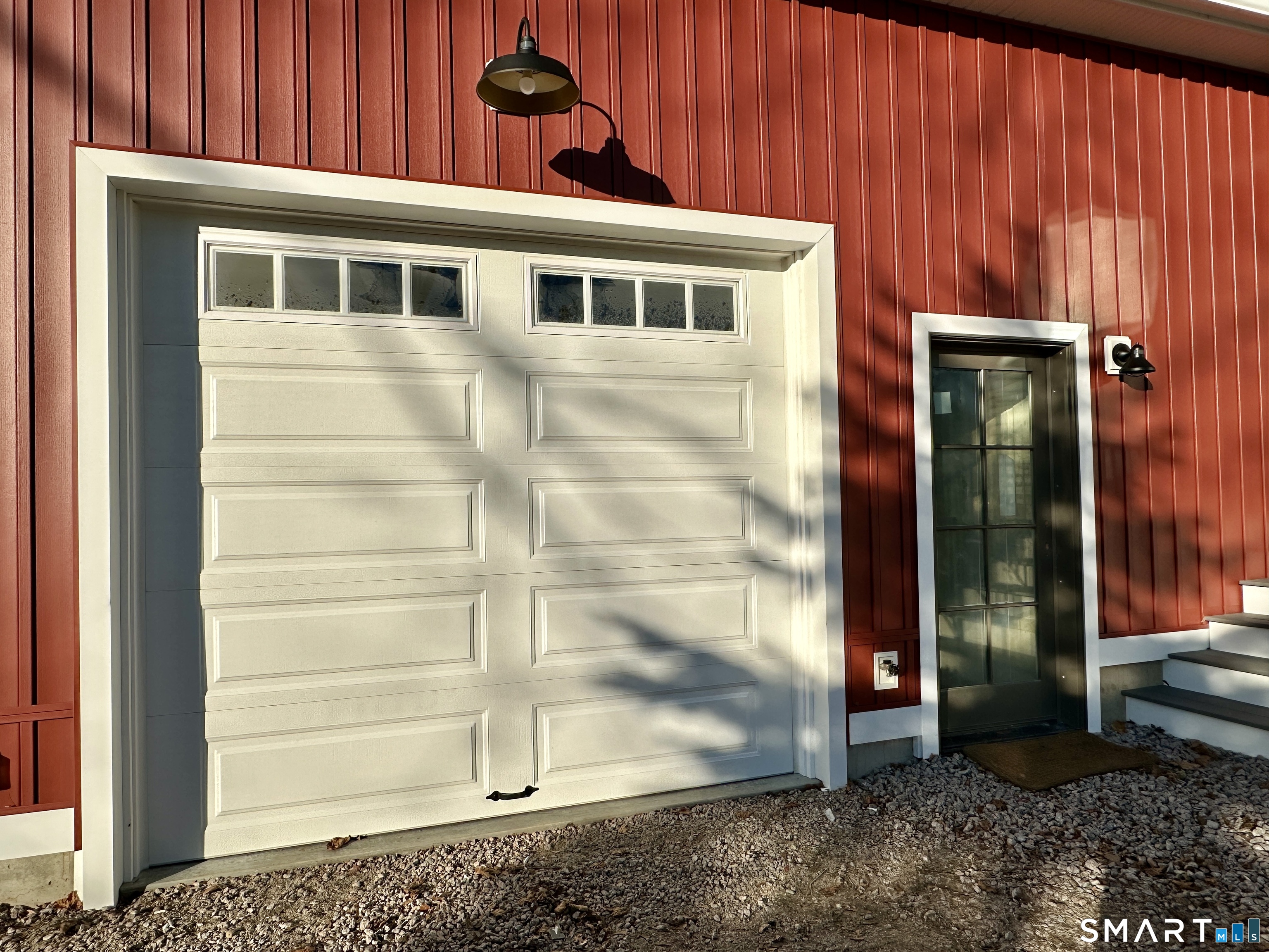 48 Cedar Street, Unit D Branford, CT 06405 - Photo 7 of 27 a front view of a house with a yard