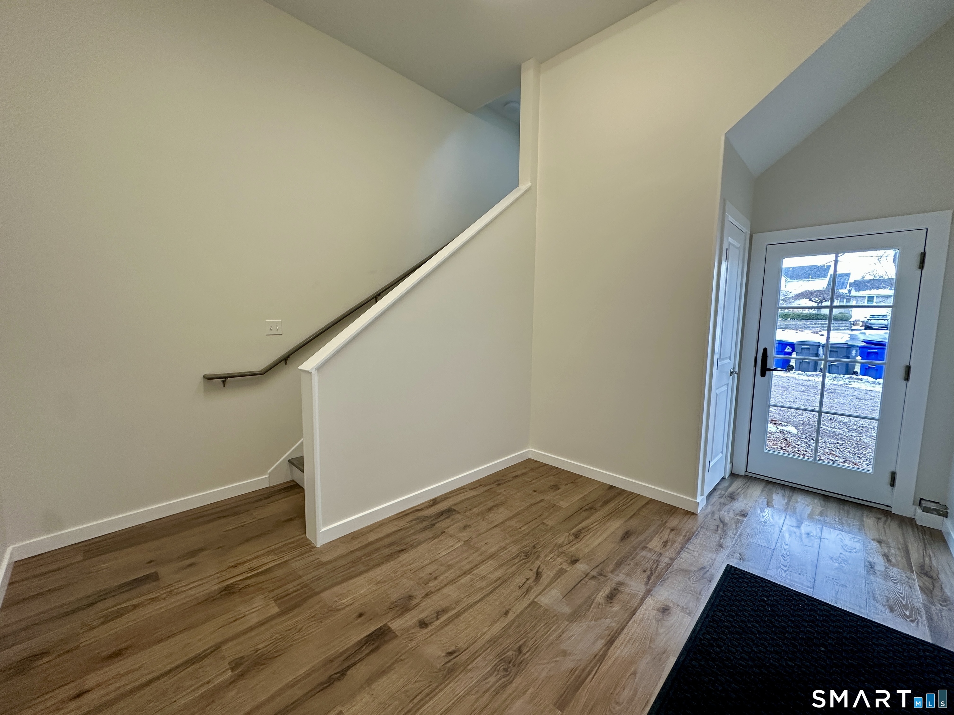 48 Cedar Street, Unit D Branford, CT 06405 - Photo 8 of 27 wooden floor in an empty room with a window
