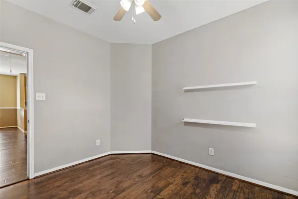 an empty room with a workbench