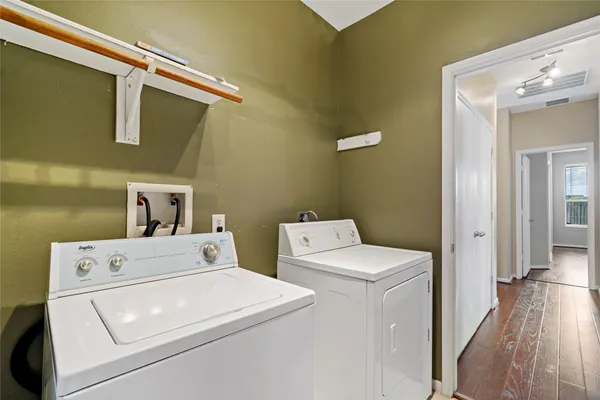 a utility room with dryer and washer