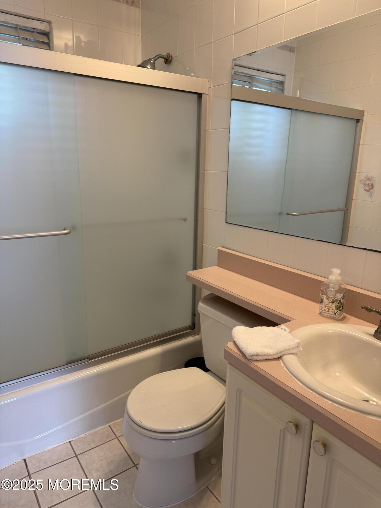 35 Sternberger Avenue, Unit A Long Branch, NJ 07740 - Photo 18 of 18 a bathroom with a sink and a toilet