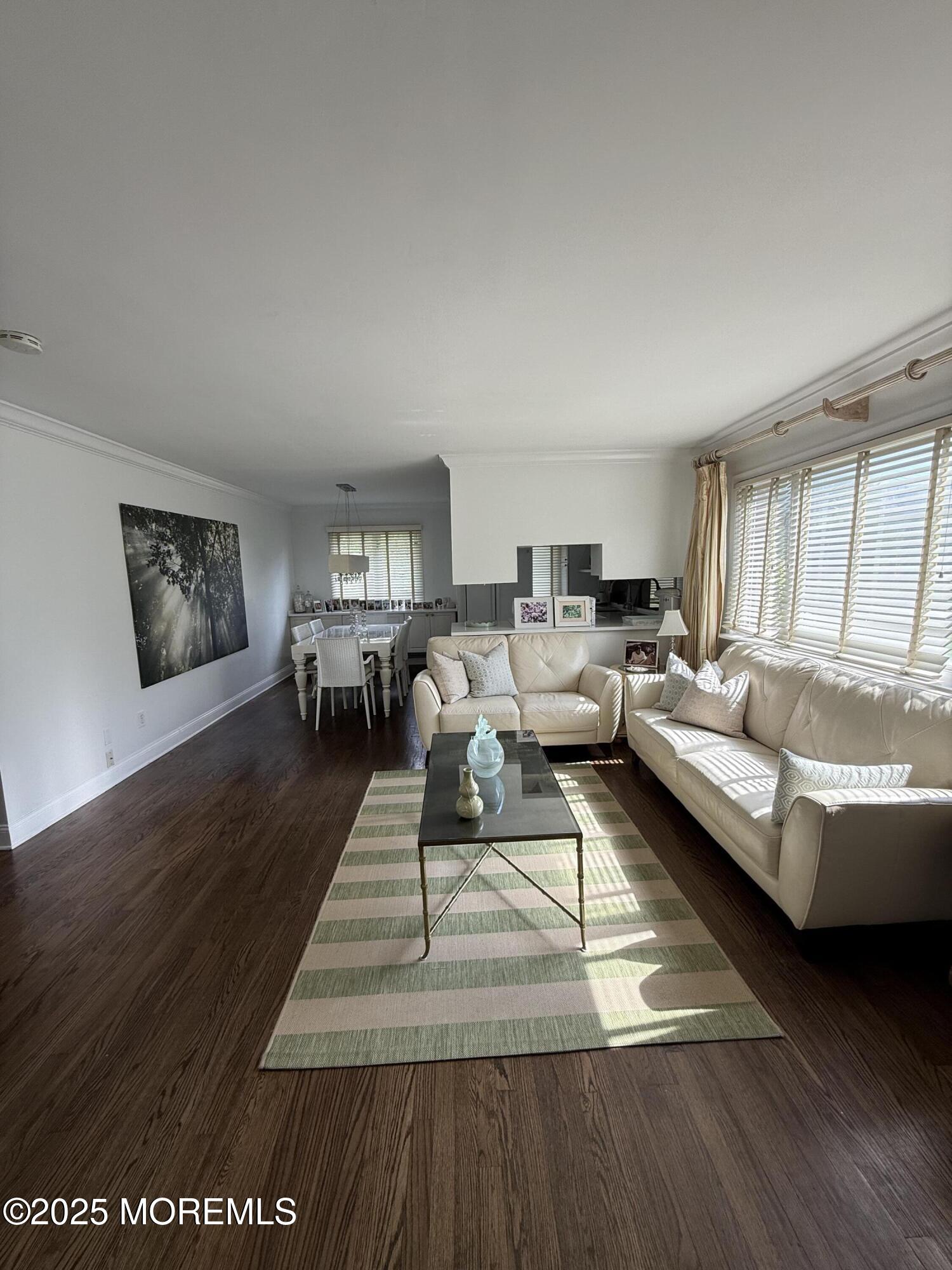 35 Sternberger Avenue, Unit A Long Branch, NJ 07740 - Photo 6 of 18 a living room with furniture and a wooden floor