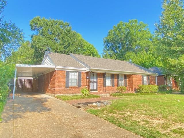 1867 Dearing Road Memphis, TN 38117 - Photo 1 of 25 a front view of a house with a yard