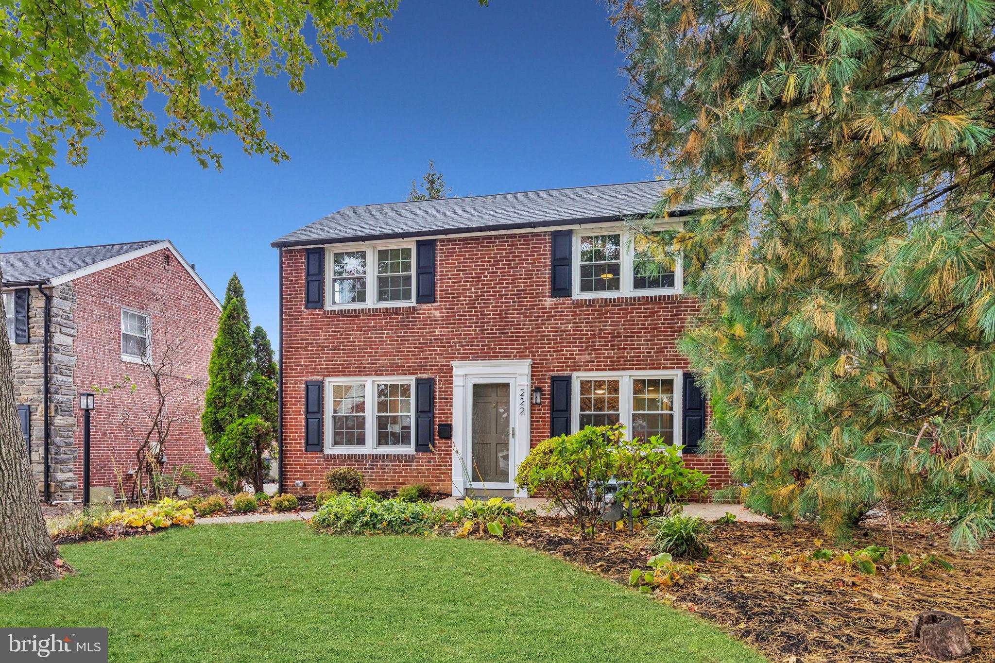 222 Harrogate Road Wynnewood, PA 19096 - Photo 2 of 43 front view of a house with a yard