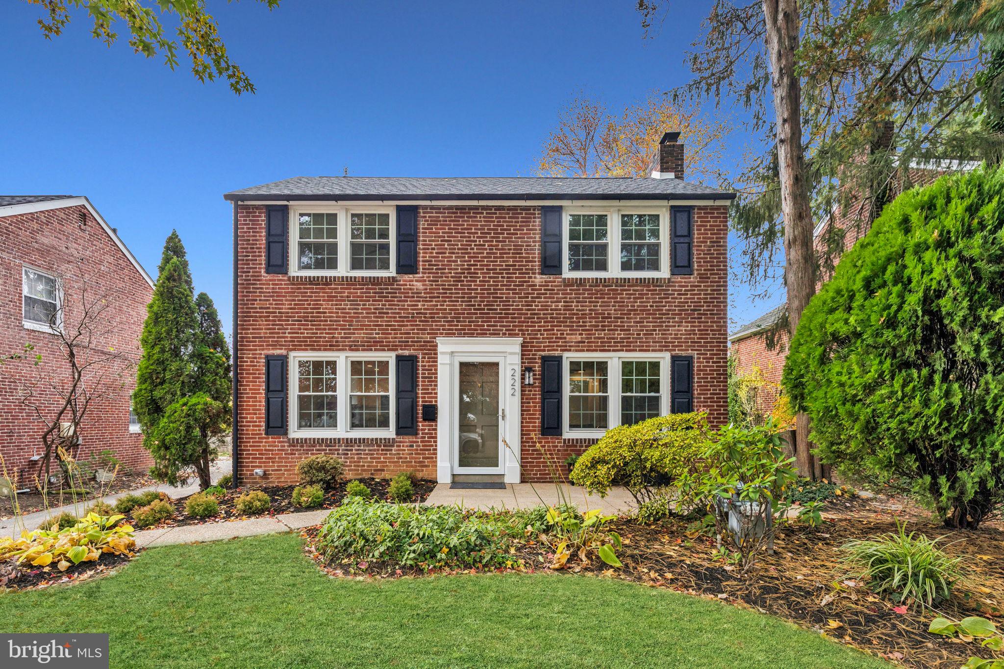 222 Harrogate Road Wynnewood, PA 19096 - Photo 3 of 43 a front view of a house with a yard