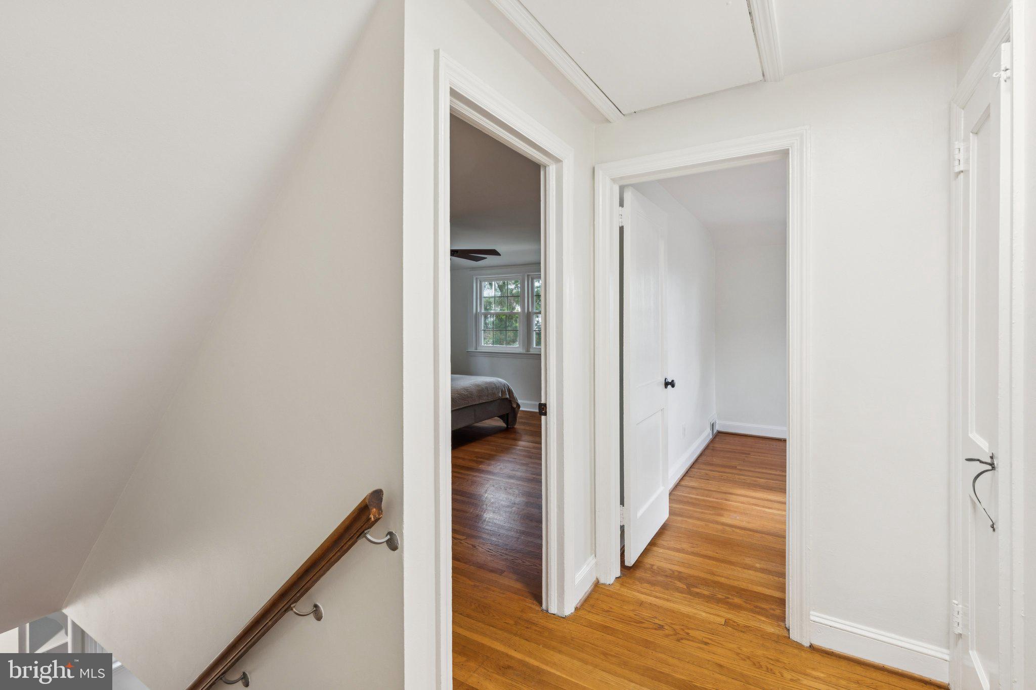 222 Harrogate Road Wynnewood, PA 19096 - Photo 32 of 43 a view of a hallway with wooden floor