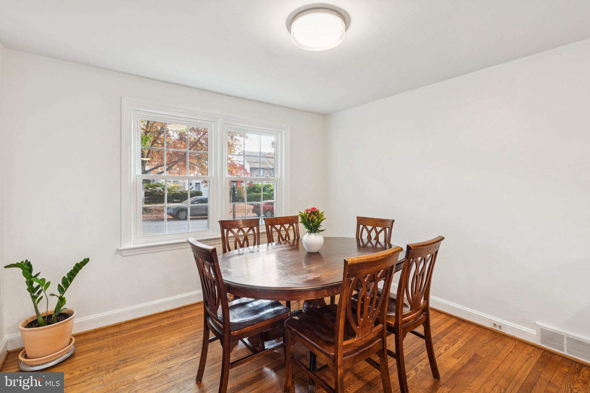 222 Harrogate Road Wynnewood, PA 19096 - Photo 10 of 43 a view of a dining room with furniture and wooden floor