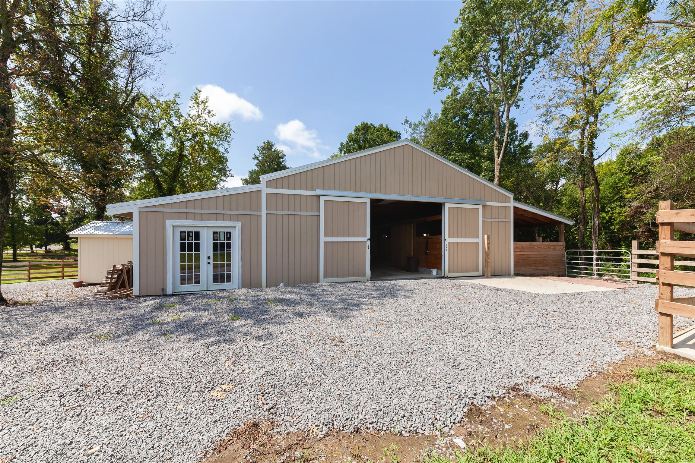 123 Mount Olivet Road Wartrace, TN 37183 - Photo 26 of 30 60x72 barn with 12x48 workshop on a separate 200 amp meter