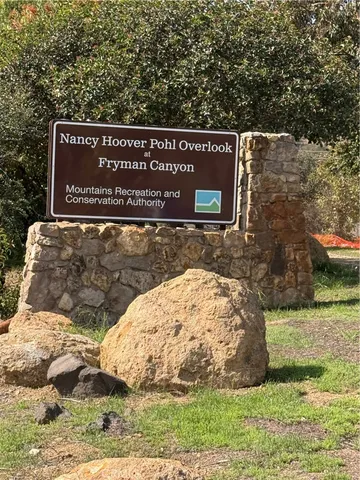 a sign on the side of the road