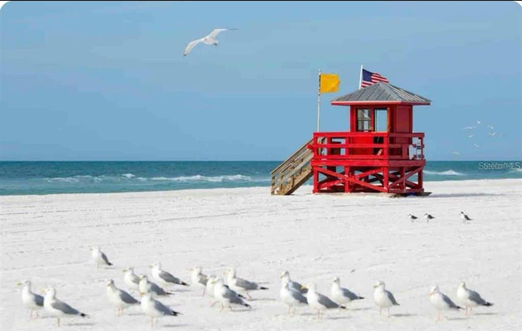 8870 Huntington Pointe Drive Sarasota, FL 34238 - Photo 26 of 28 a front view of a house with a ocean view
