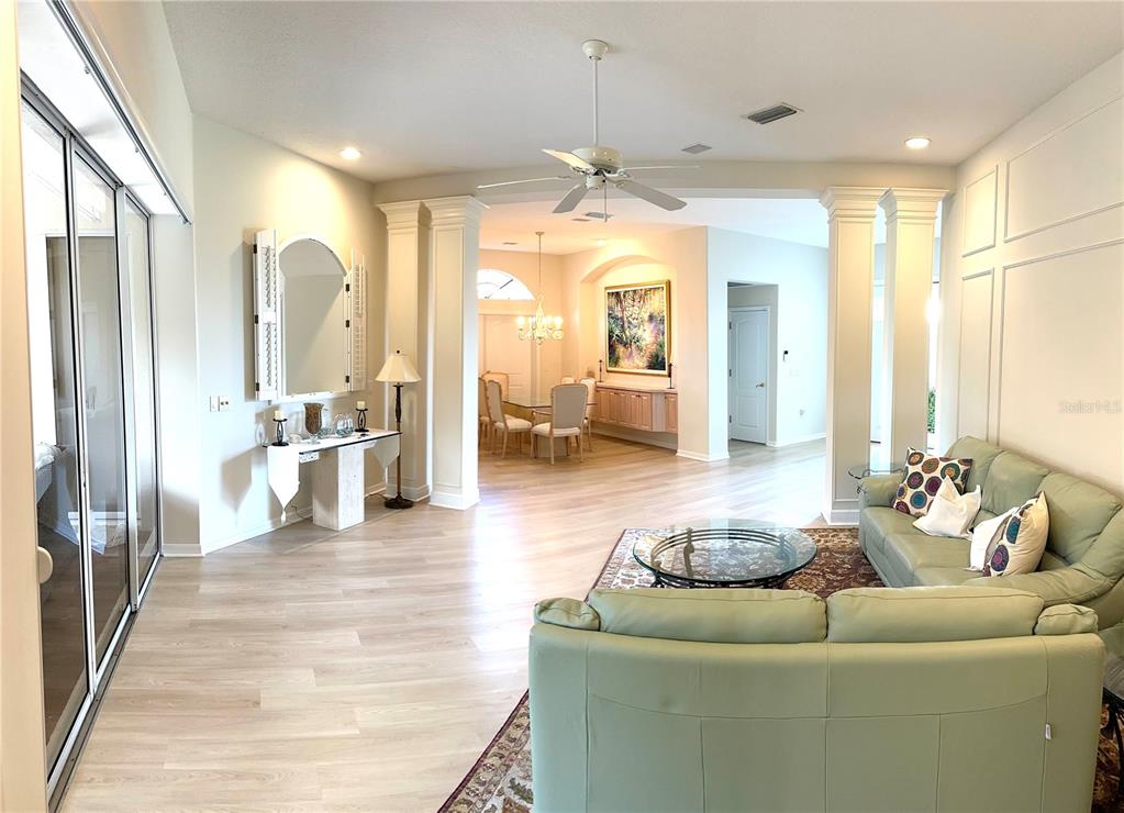 8870 Huntington Pointe Drive Sarasota, FL 34238 - Photo 6 of 28 a living room with furniture and a large window