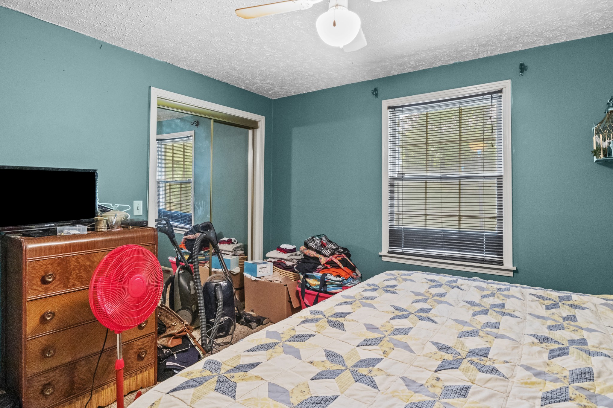 1095 Porter Road Burns, TN 37029 - Photo 18 of 34 a bedroom with furniture and flat screen tv