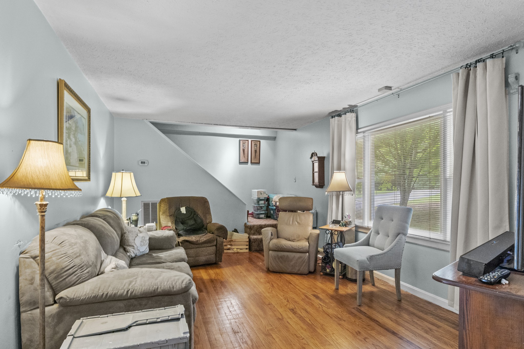 1095 Porter Road Burns, TN 37029 - Photo 6 of 34 a living room with furniture and a large window