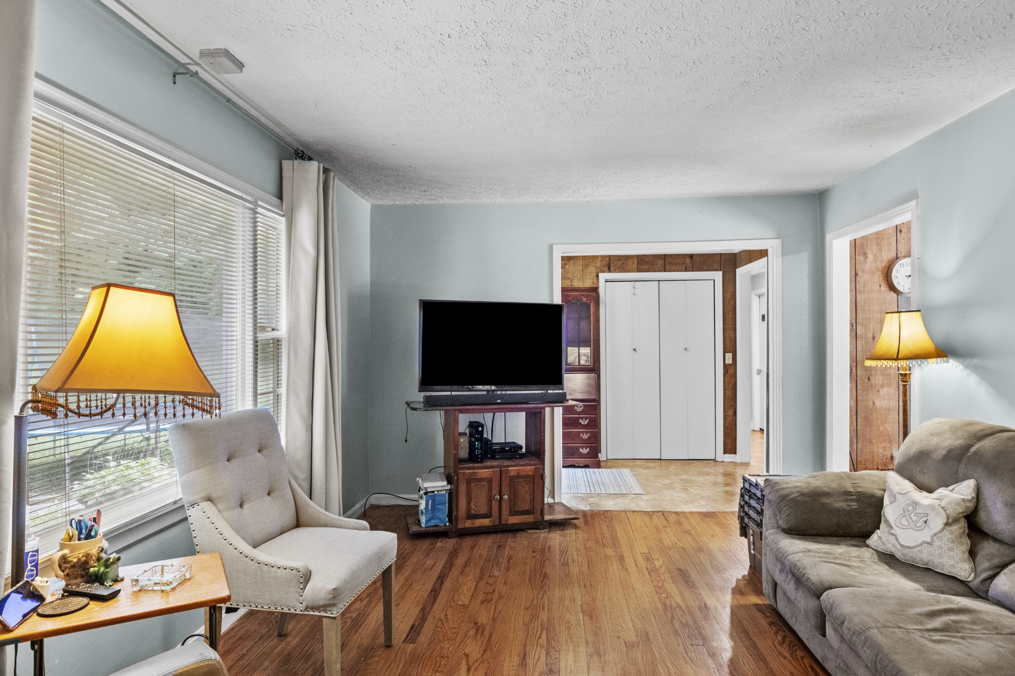 1095 Porter Road Burns, TN 37029 - Photo 7 of 34 a living room with furniture and a flat screen tv