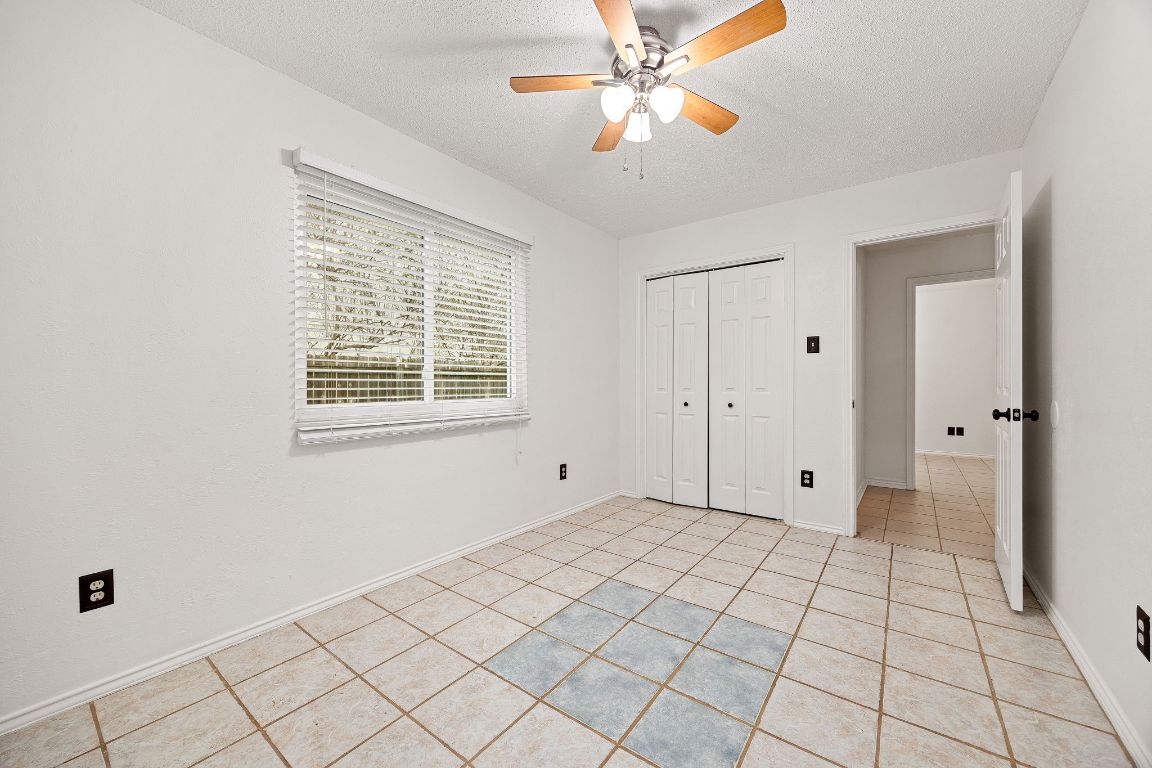2602 Armstrong Drive Leander, TX 78641 - Photo 16 of 22 a view of an empty room with window