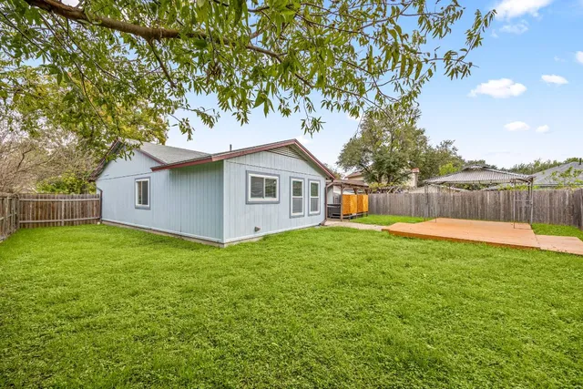 a house view with a garden space