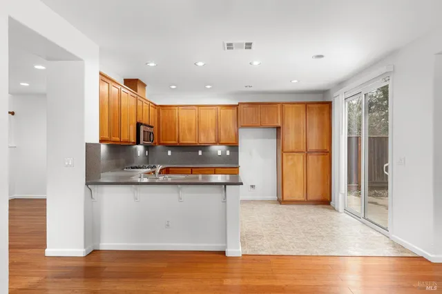 a bedroom with furniture and window