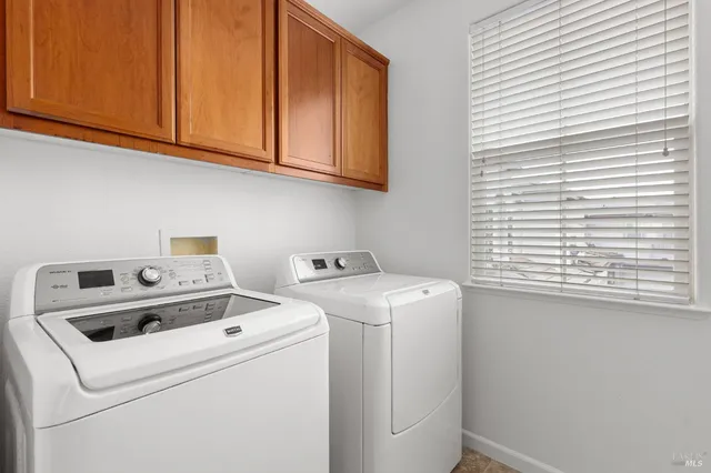 an empty room with closet area