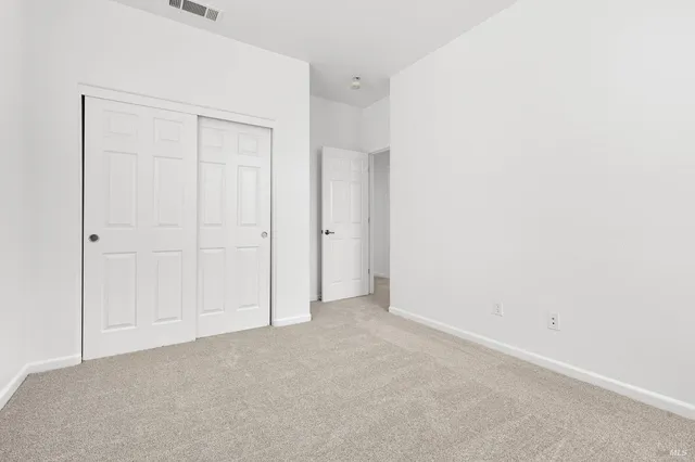 a view of a backyard of the house