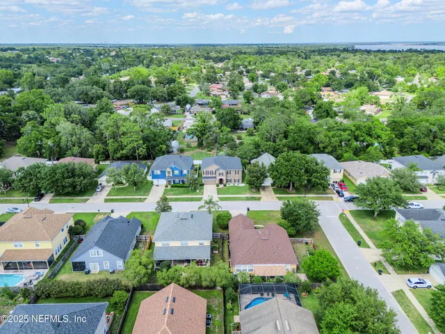 an aerial view of a house with a garden