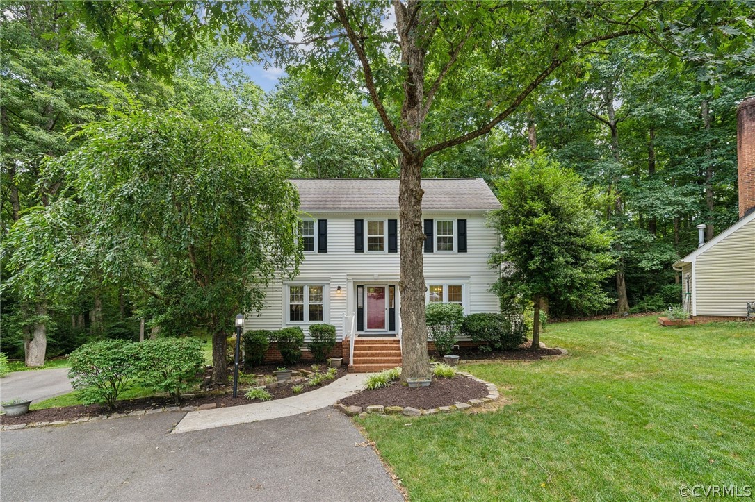 1725 Abbot's Mill Way Midlothian, VA 23114 - Photo 1 of 30 a front view of a house with a yard and trees