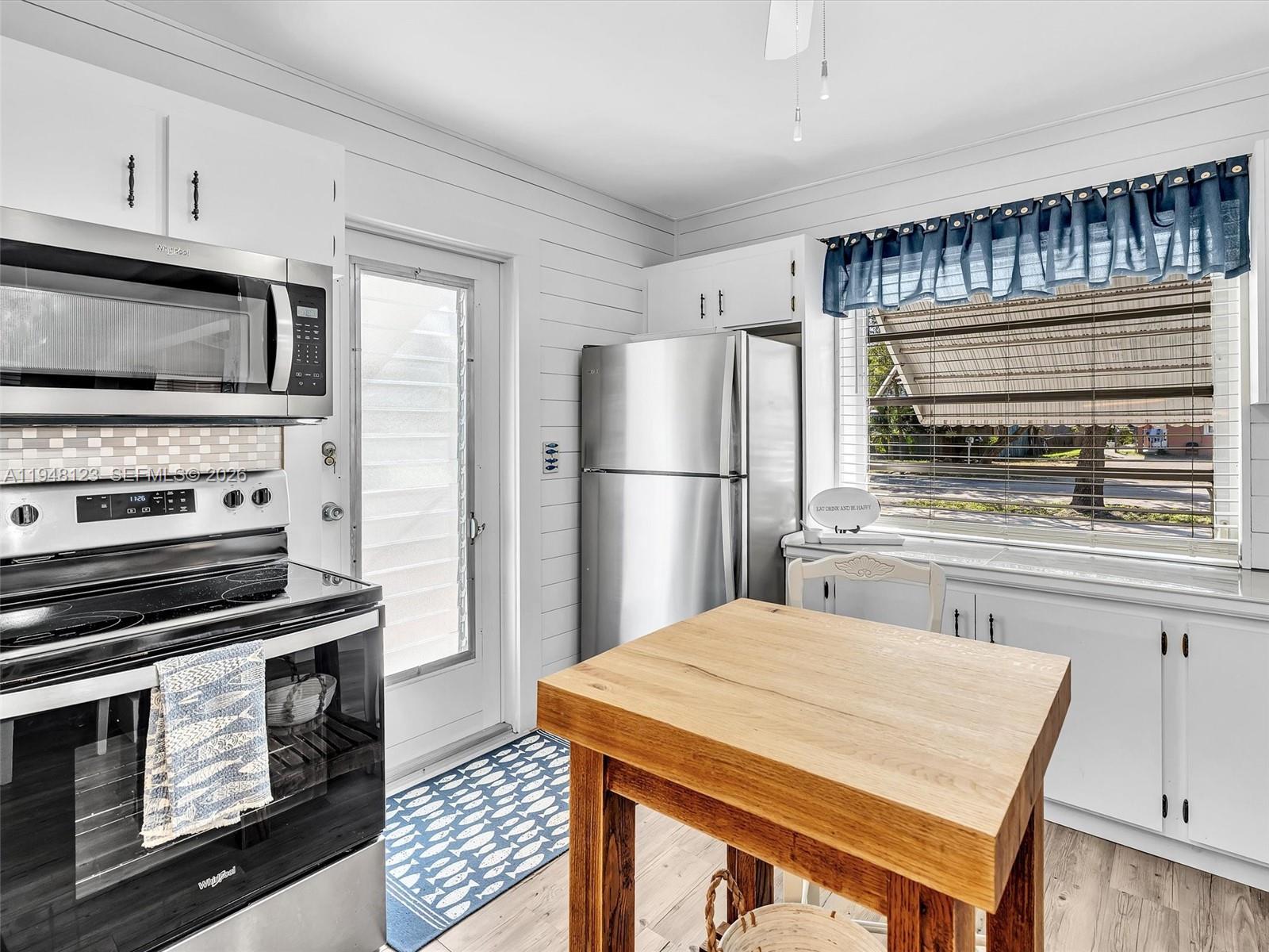 2539 Cleveland Street Hollywood, FL 33020 - Photo 20 of 52 Step out to your garden from the Kitchen